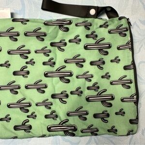 Itzy ritzy travel happens ™️ wet bag green